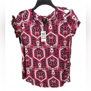 A cool cold-shoulder spin on comfortable knit styling, JM Collection's petite